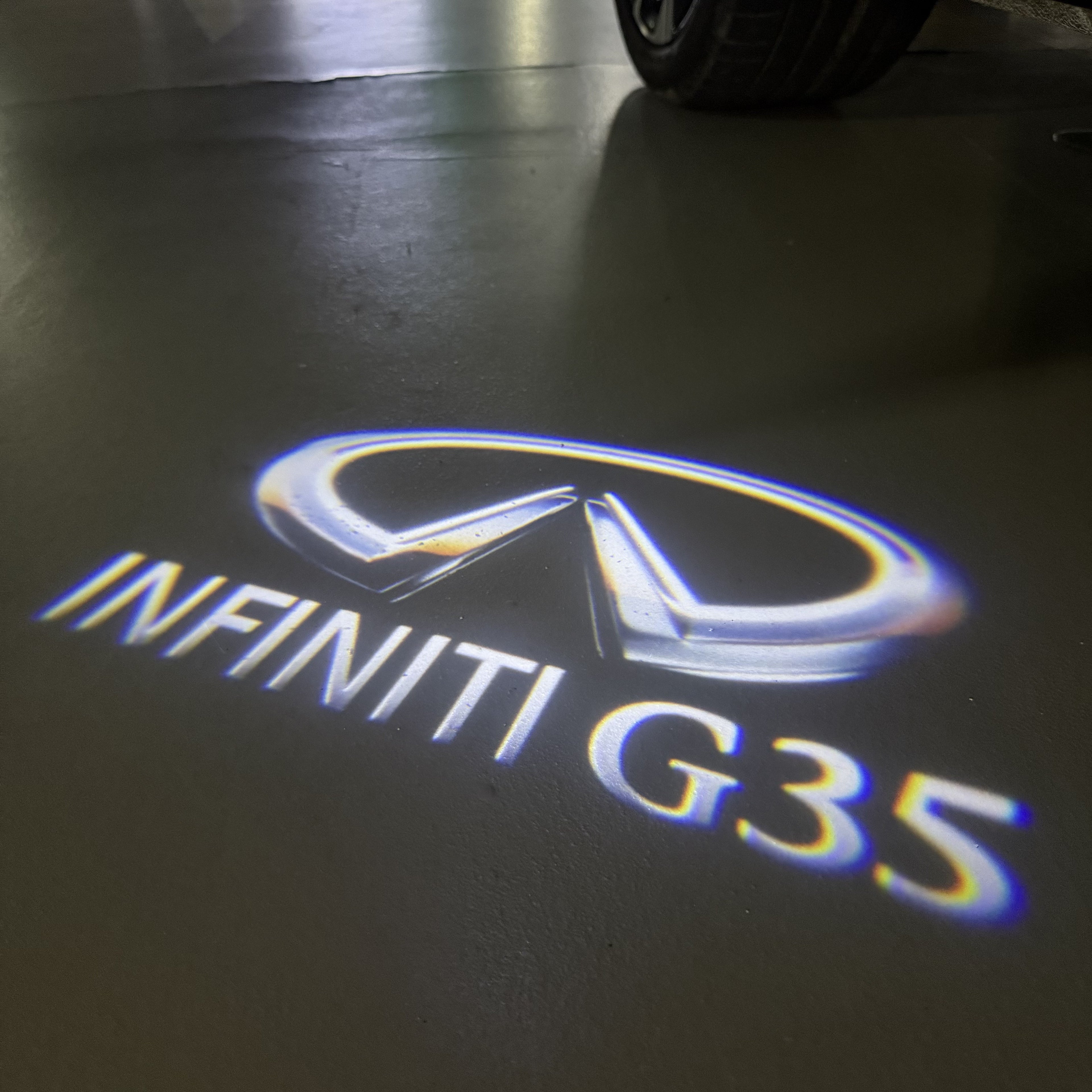 INFINITI  G35 LOGO PROJECROTR LIGHTS  (quantity 1 = 1 sets/2 door lights)Nr.74A60
