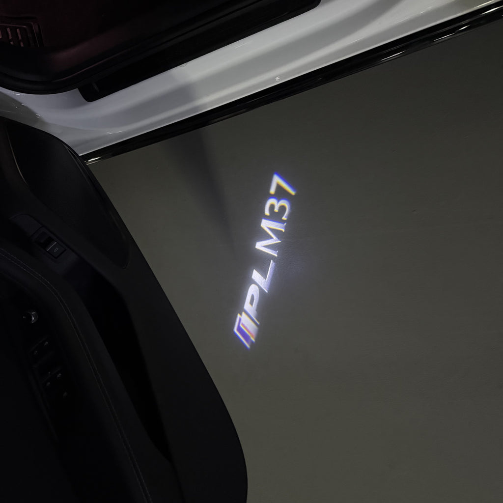 INFINITI  M37 LOGO PROJECROTR LIGHTS  (quantity 1 = 1 sets/2 door lights)Nr.74A86