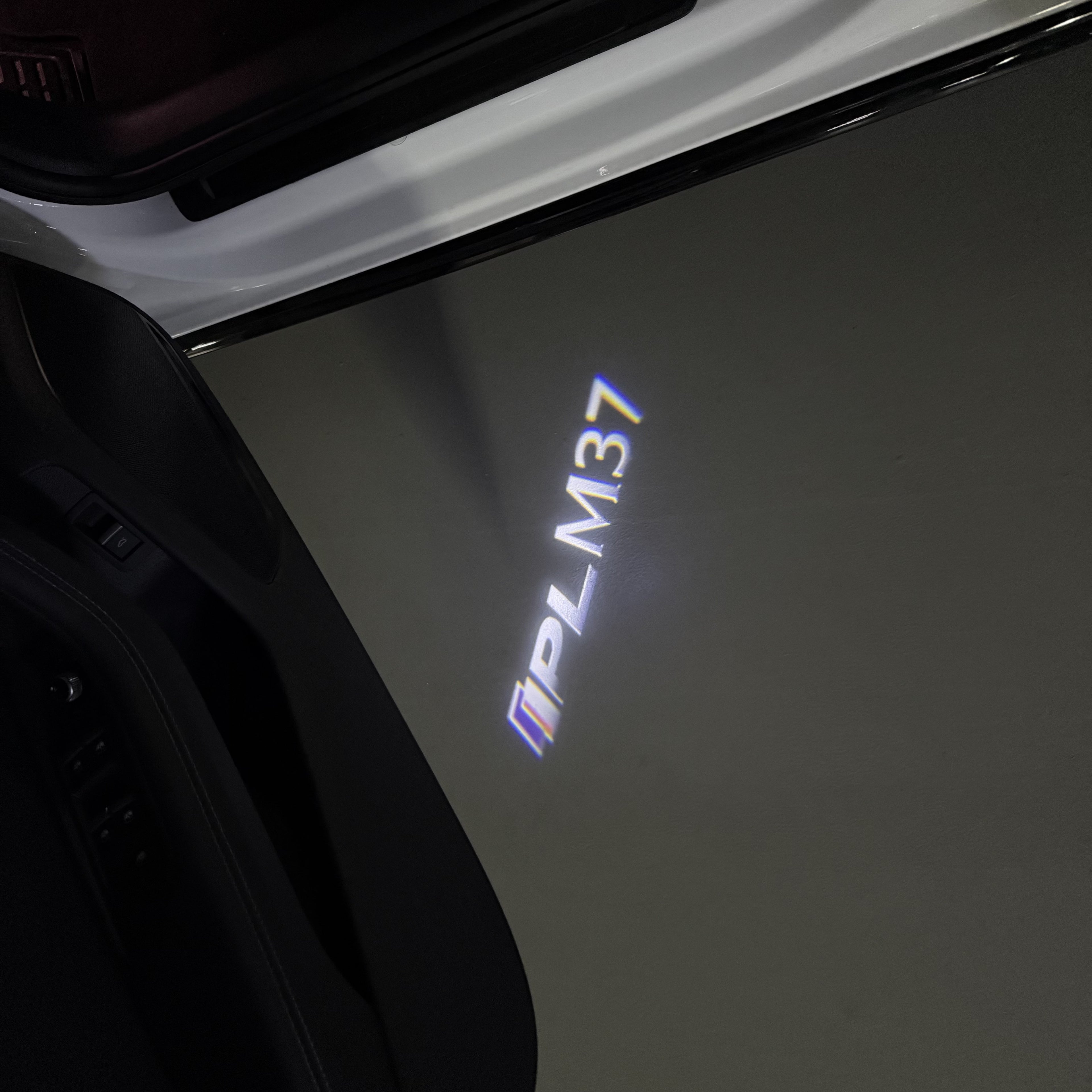 INFINITI  M37 LOGO PROJECROTR LIGHTS  (quantity 1 = 1 sets/2 door lights)Nr.74A86