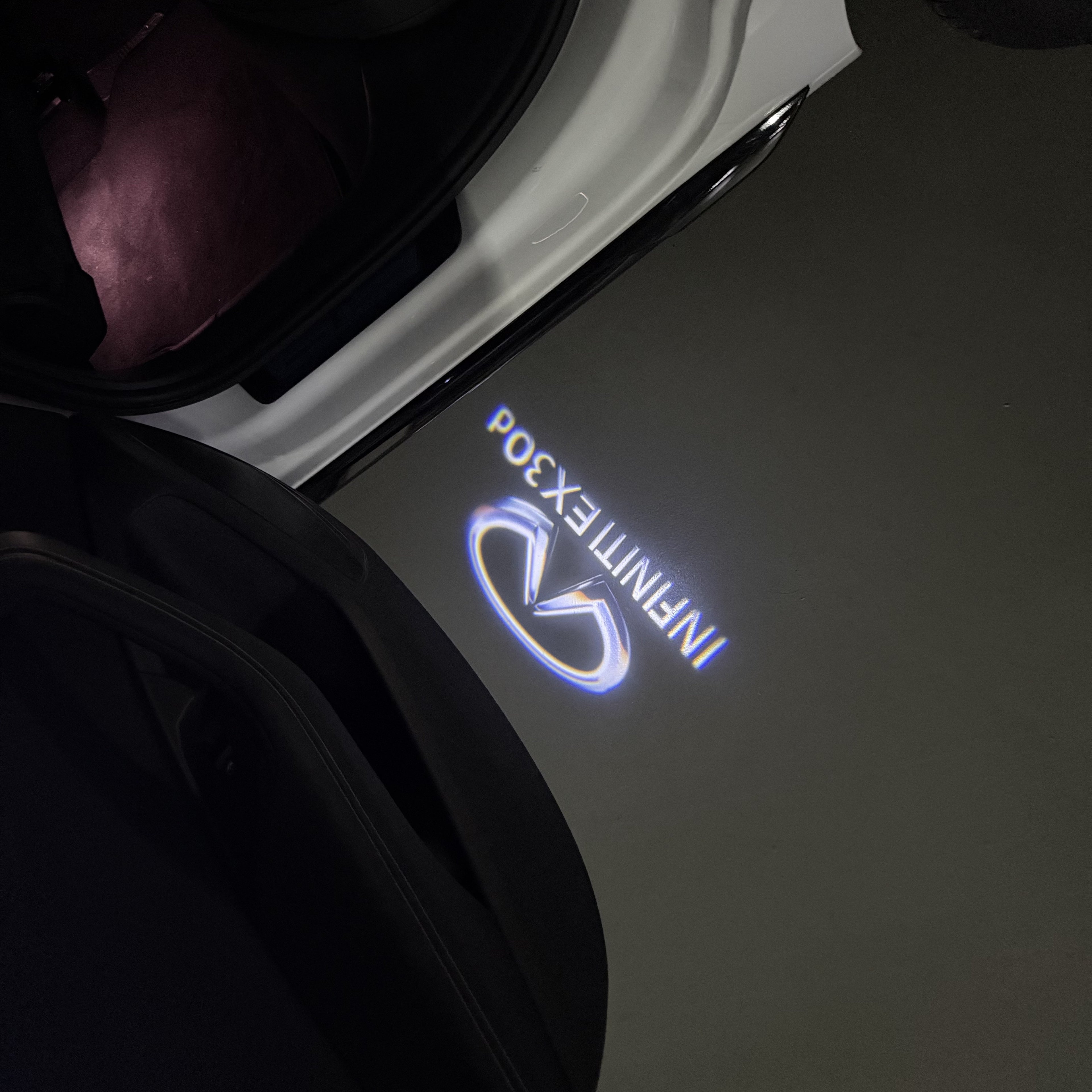 INFINITI  EX30d LOGO PROJECROTR LIGHTS  (quantity 1 = 1 sets/2 door lights)Nr.74A49
