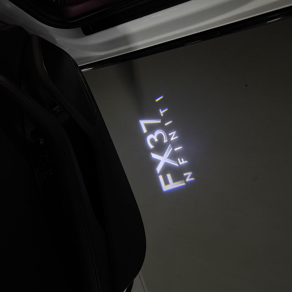 INFINITI  FX37 LOGO PROJECROTR LIGHTS  (quantity 1 = 1 sets/2 door lights)Nr.74A72