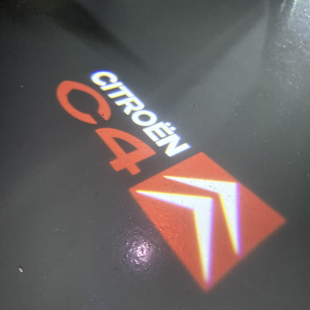 CITROËN C4  LOGO PROJECTOT LIGHTS (quantity 1 = 1 sets/2 door lights) Nr.6024q0t0141