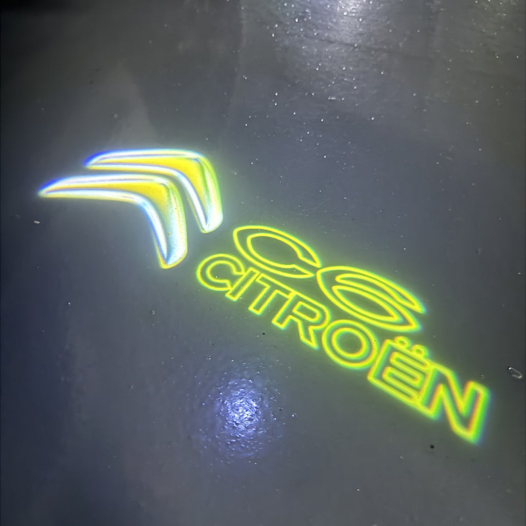 CITROËN C6  LOGO PROJECTOT LIGHTS (quantity 1 = 1 sets/2 door lights) Nr.6024q0t0132