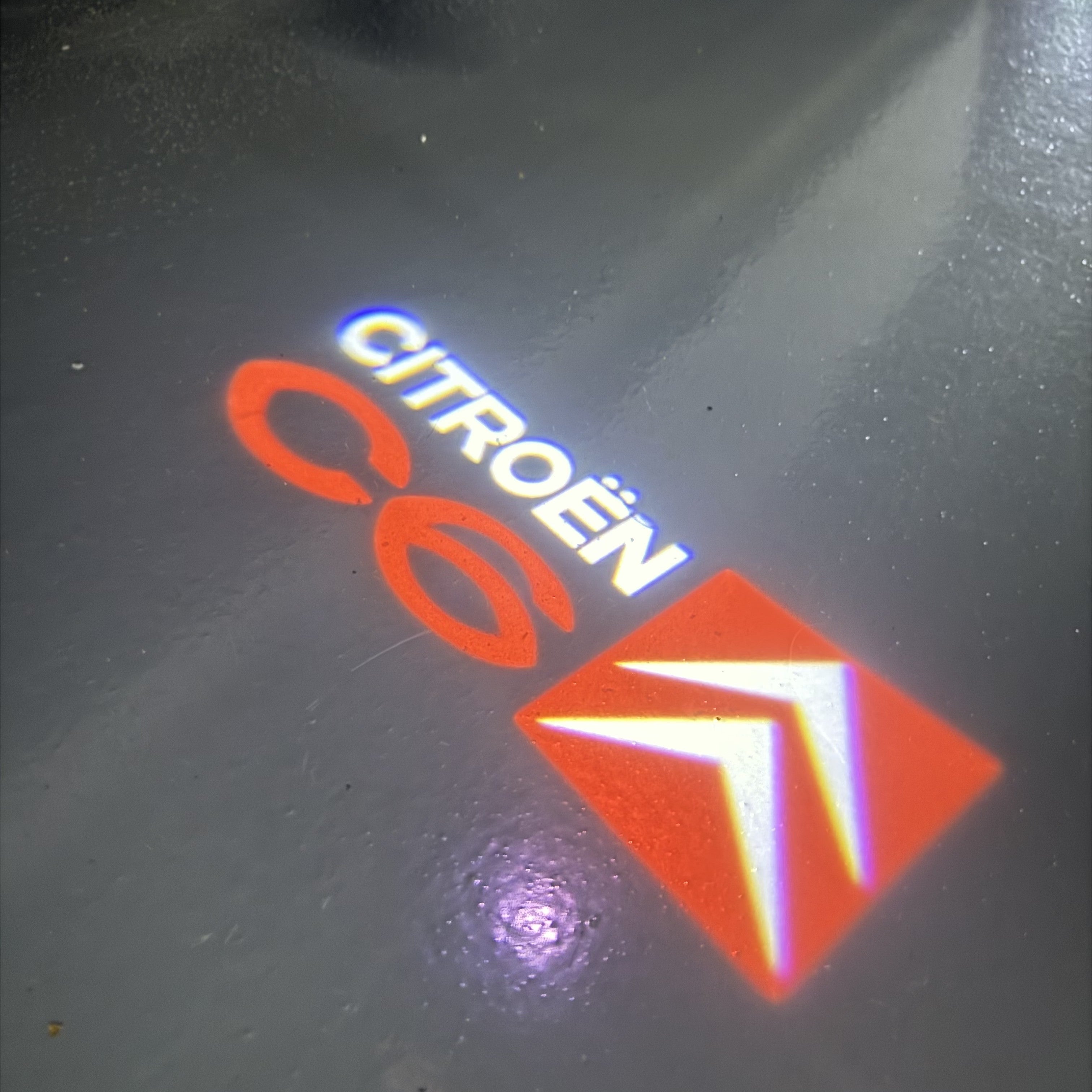 CITROËN  C6  LOGO PROJECTOT LIGHTS (quantity 1 = 1 sets/2 door lights) Nr.6024q0t0135