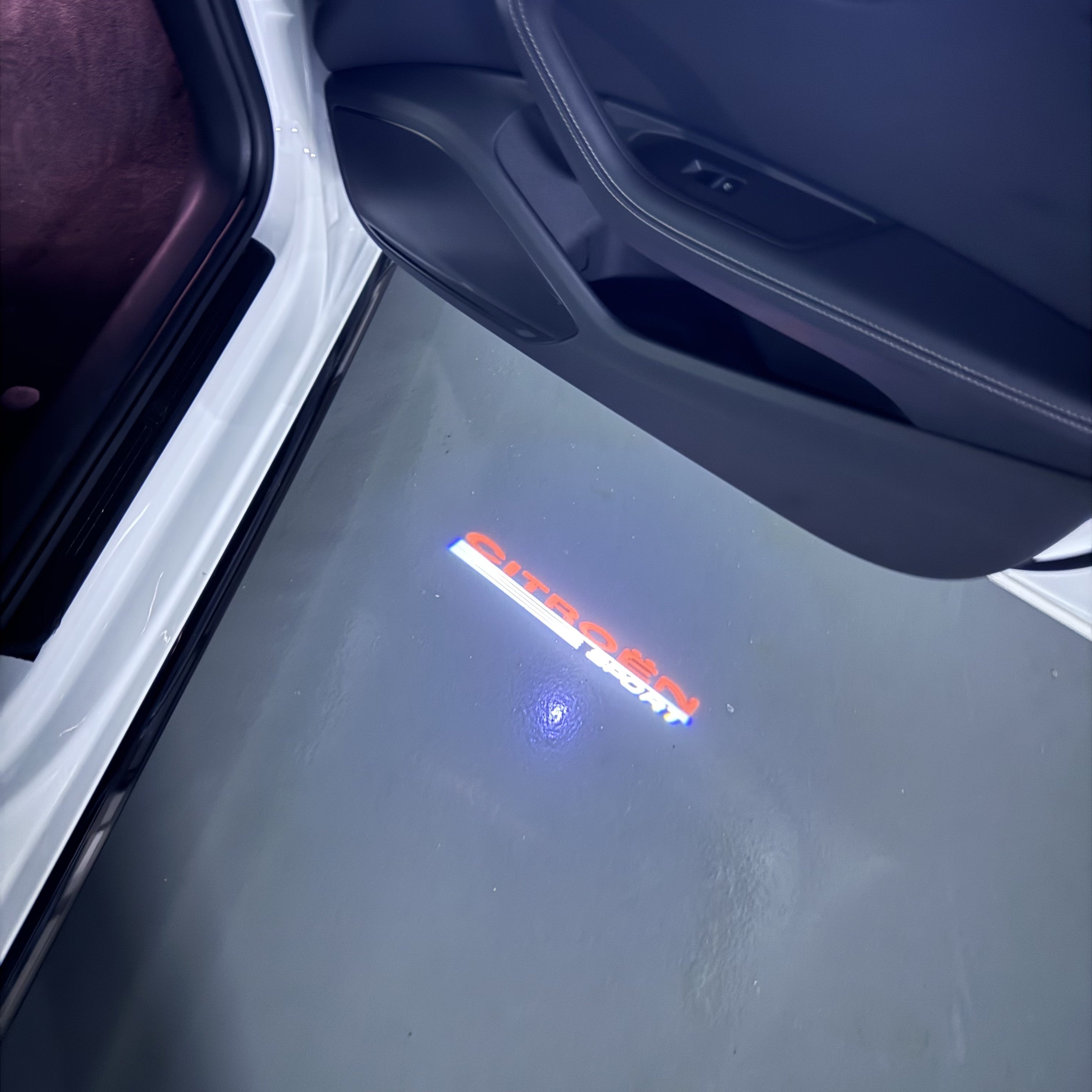 CITROËN SPORT  LOGO PROJECTOT LIGHTS (quantity 1 = 1 sets/2 door lights) Nr.6024q0t0131