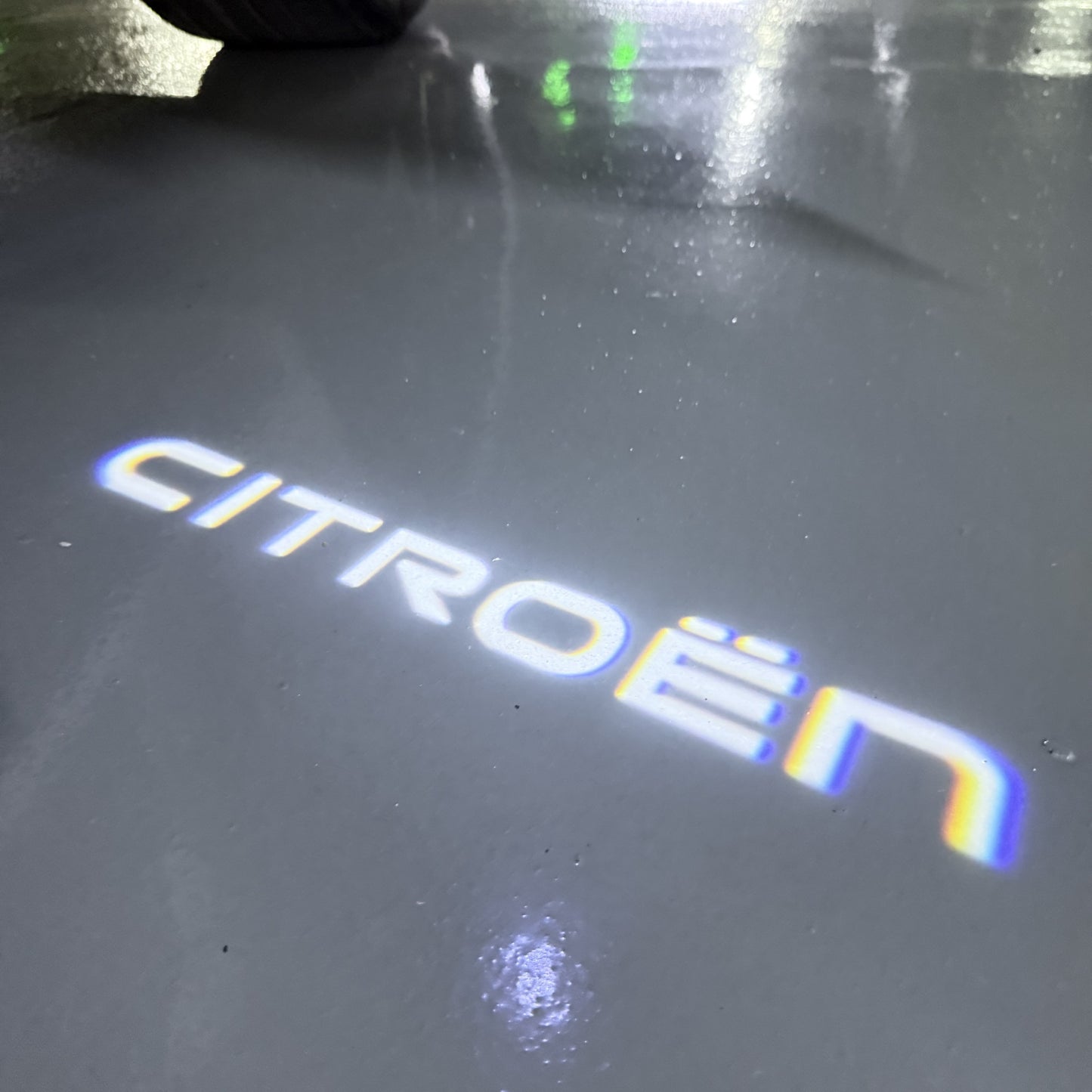 CITROËN Original   LOGO PROJECTOT LIGHTS (quantity 1 = 1 sets/2 door lights) Nr.6024q0t0105