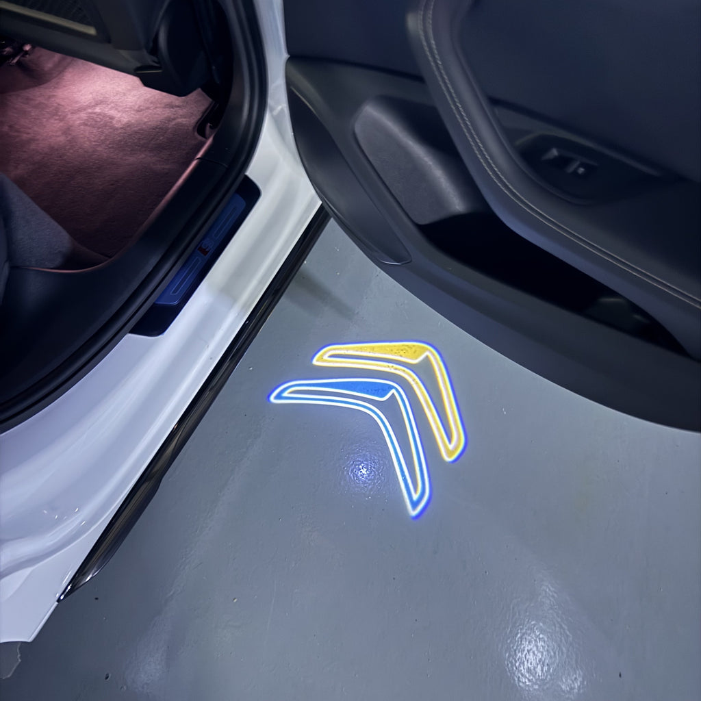 CITROËN Original   LOGO PROJECTOT LIGHTS (quantity 1 = 1 sets/2 door lights) Nr.6024q0t0147