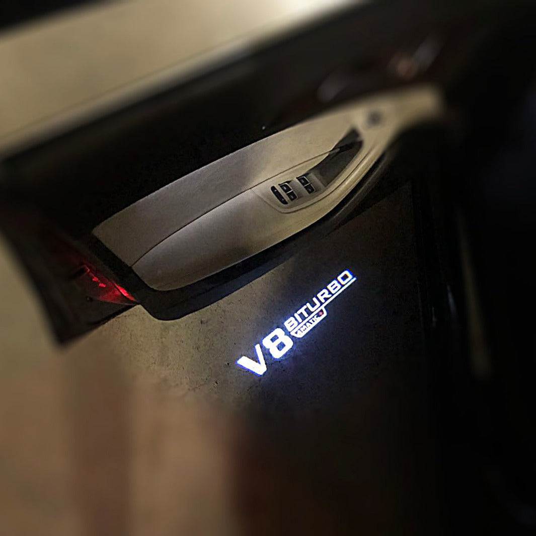 MERCEDES BENZ V8  BITURBO LOGO PROJECTOT LIGHTS Nr.22 (quantity 1 = 1 sets/2 door lights)