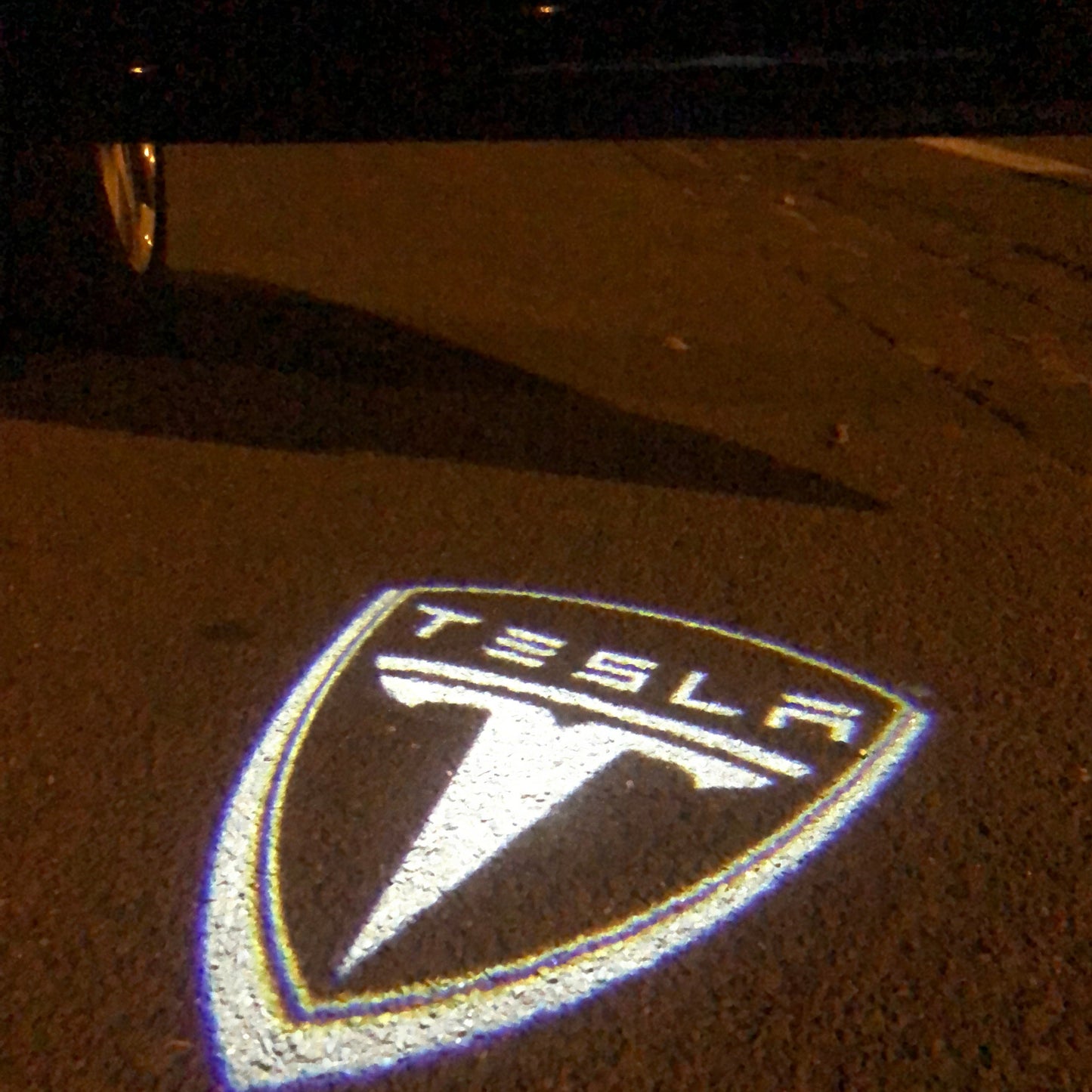 TESLA LOGO PROJECROTR LIGHTS Nr.1506 (quantity  1 =  2 Logo Film /  2 door lights)