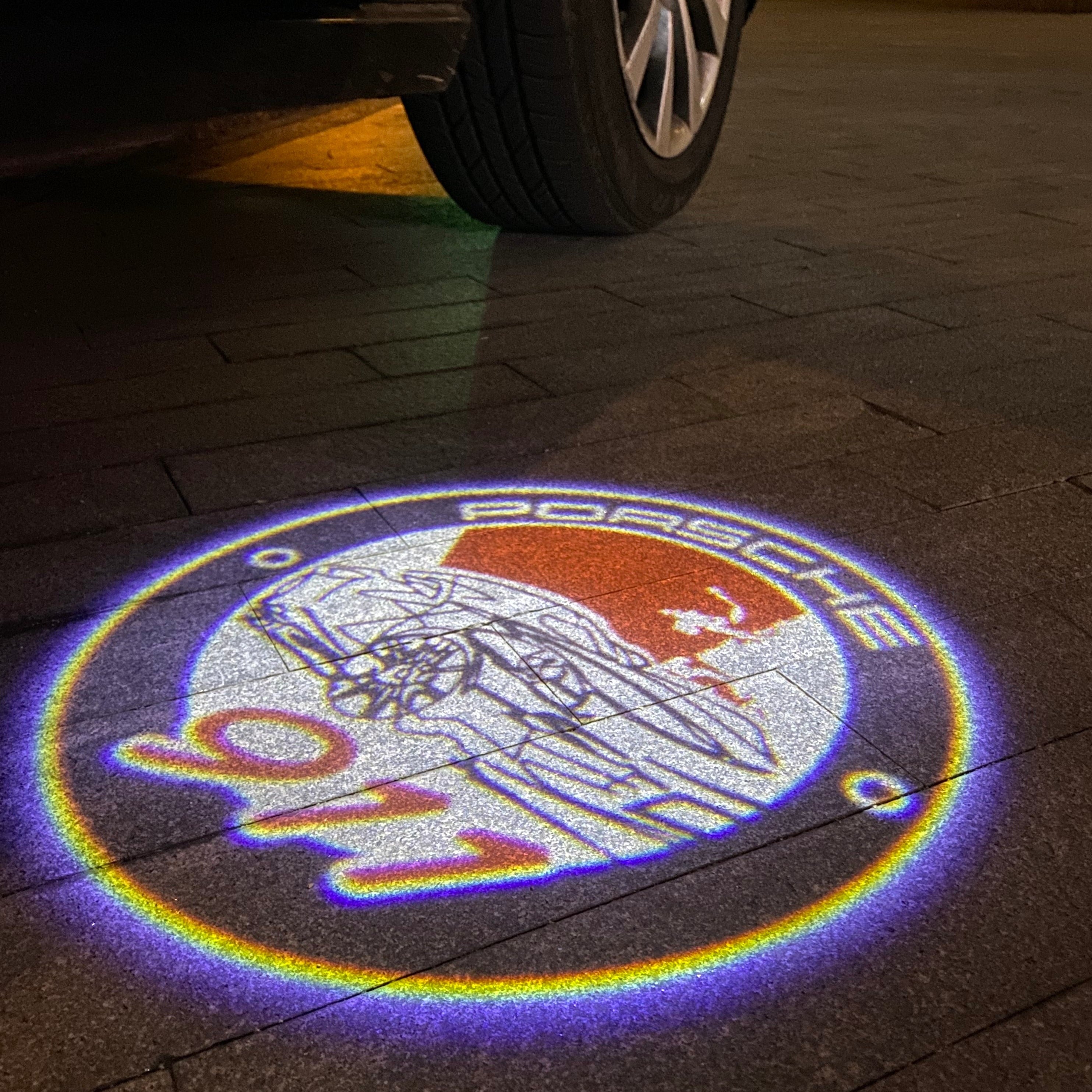 PORSCHE  911  LOGO PROJECTOT LIGHTS Nr.47 (quantity  1 =  2 Logo Film /  2 door lights)