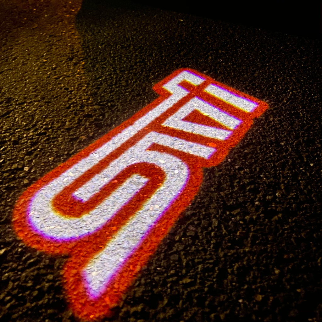 STI  LOGO PROJECROTR LIGHTS Nr.03 (quantity 1 = 1 sets/2 door lights)
