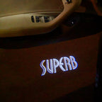 SKODA LOGO PROJECTOT LIGHTS Nr.90 (cantidad 1 = 2 Logo Film/2 luces de puerta)