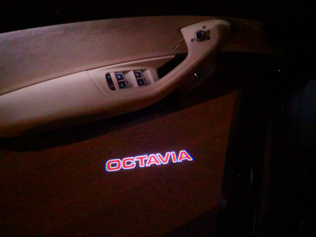 SKODA OCTAVIA LOGO LIGHTS Nr.106 (cantidad 1 = 2 logo película / 2 luces de puerta)