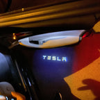 TESLA LOGO PROJECROTR LIGHTS Nr.1503 (quantity  1 =  2 Logo Film /  2 door lights)