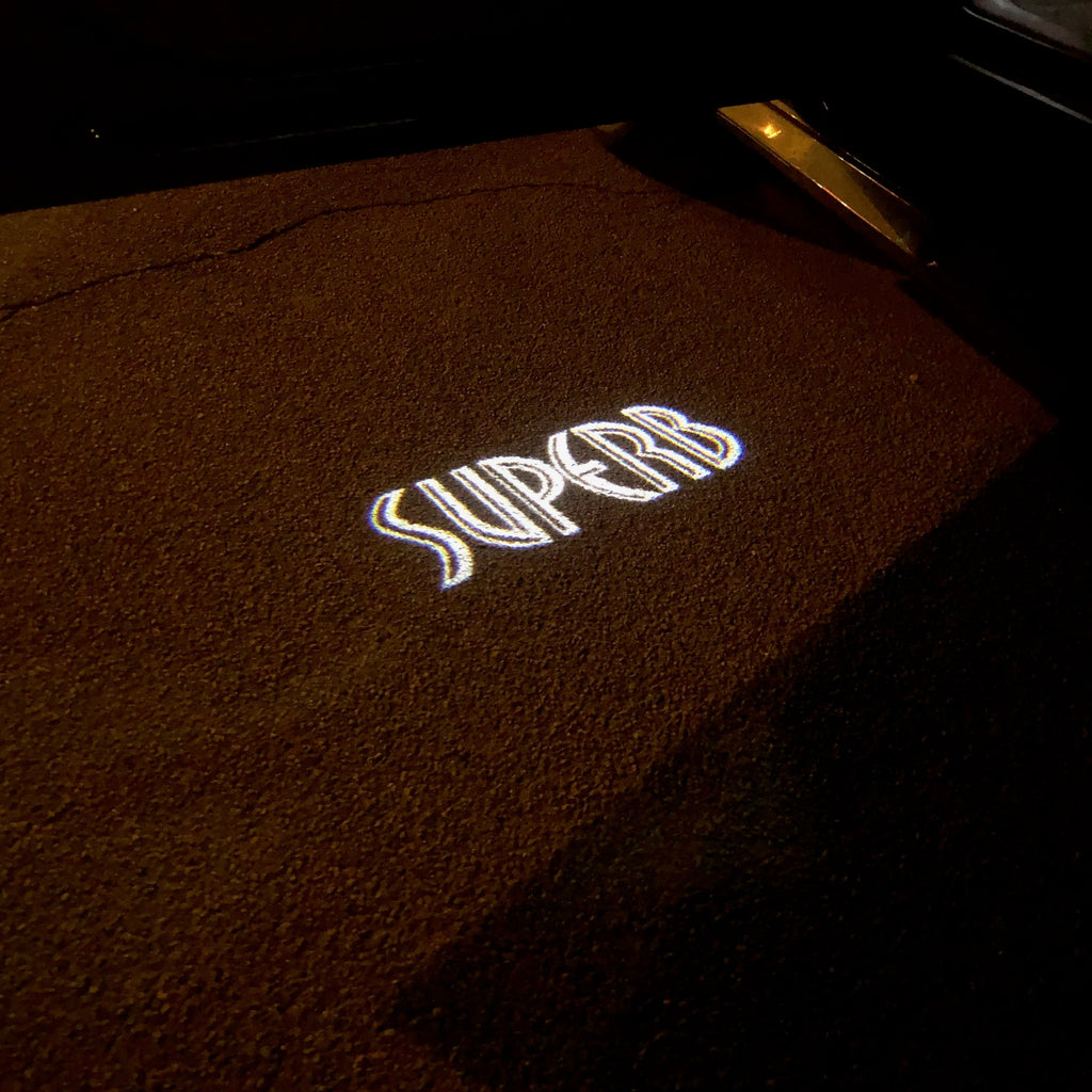 SKODA LOGO PROJECTOT LIGHTS Nr.90 (cantidad 1 = 2 Logo Film/2 luces de puerta)