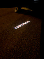SKODA OCTAVIA LOGO LIGHTS Nr.106 (cantidad 1 = 2 logo película / 2 luces de puerta)