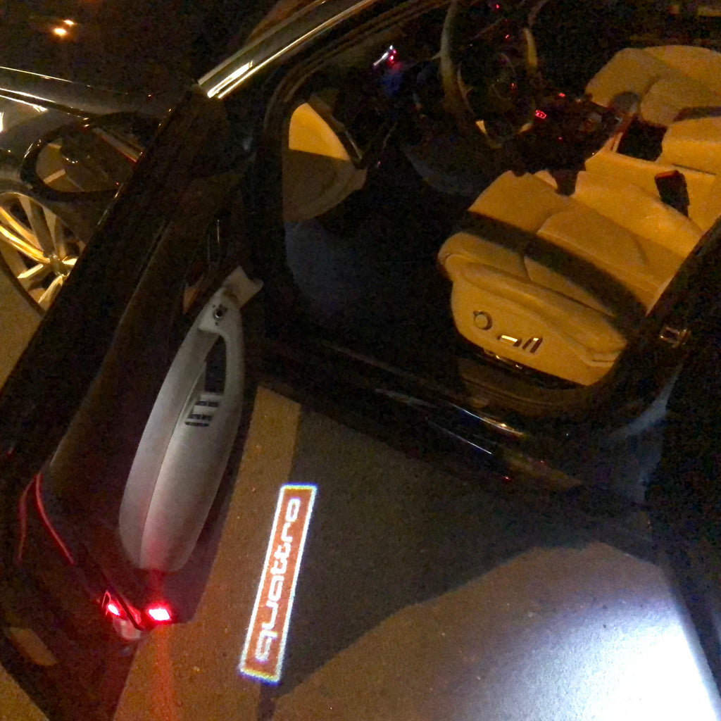 AUDI QUATTRO LOGO PROJECTOT LIGHTS Nr.83  (quantity 1 = 2 Logo Films /2 door lights）