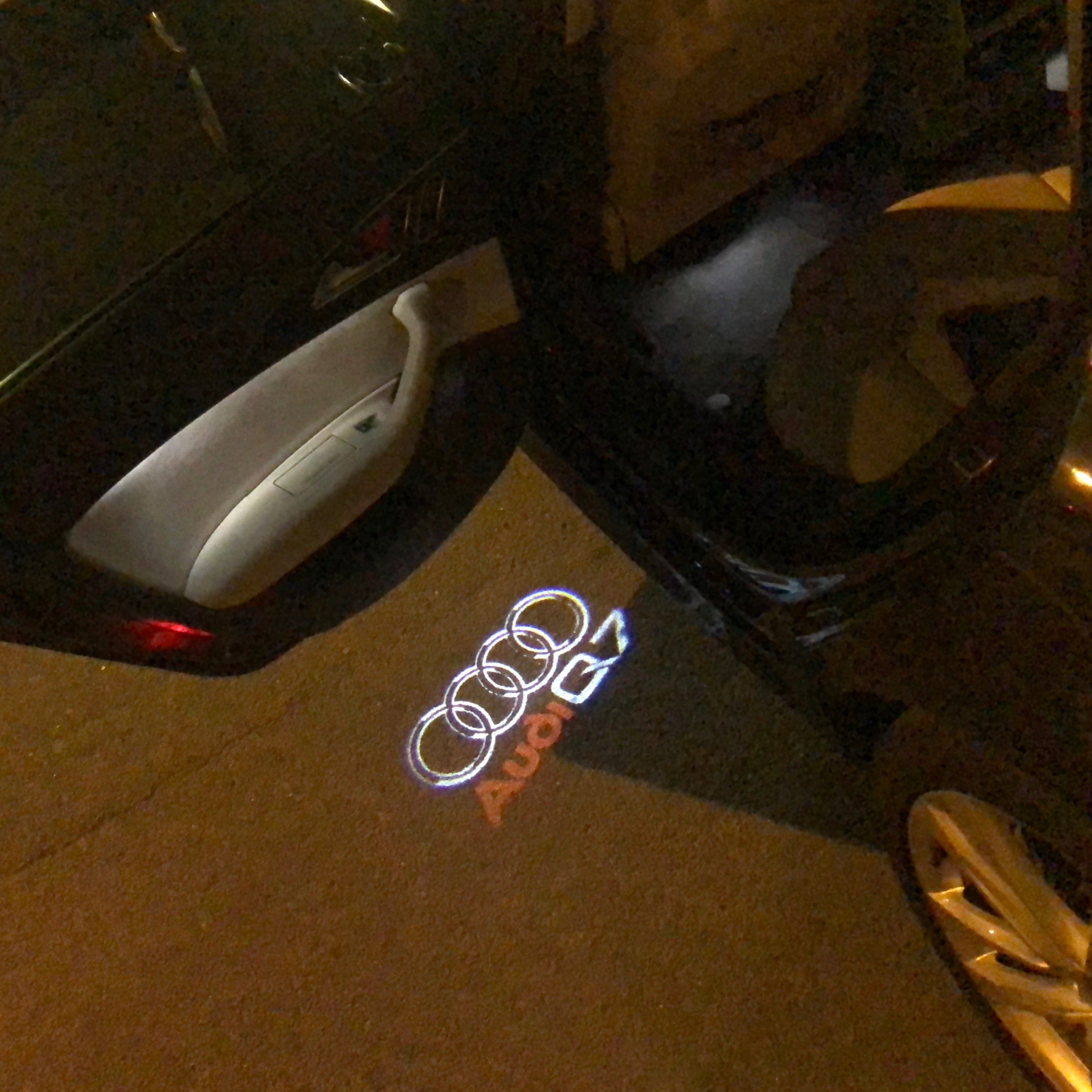 AUDI Q7 LOGO PROJECTOT LIGHTS Nr.49  (quantity 1 = 2 Logo Films /2 door lights）